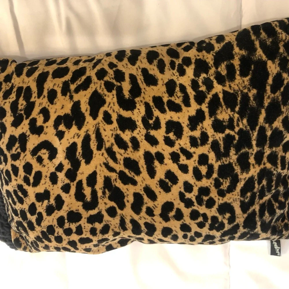 Red Velvet Square Pillow with Gold Tassels plus a leopard pillow